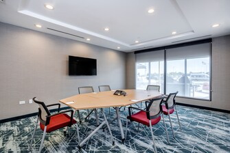 Boardroom with television and  a window