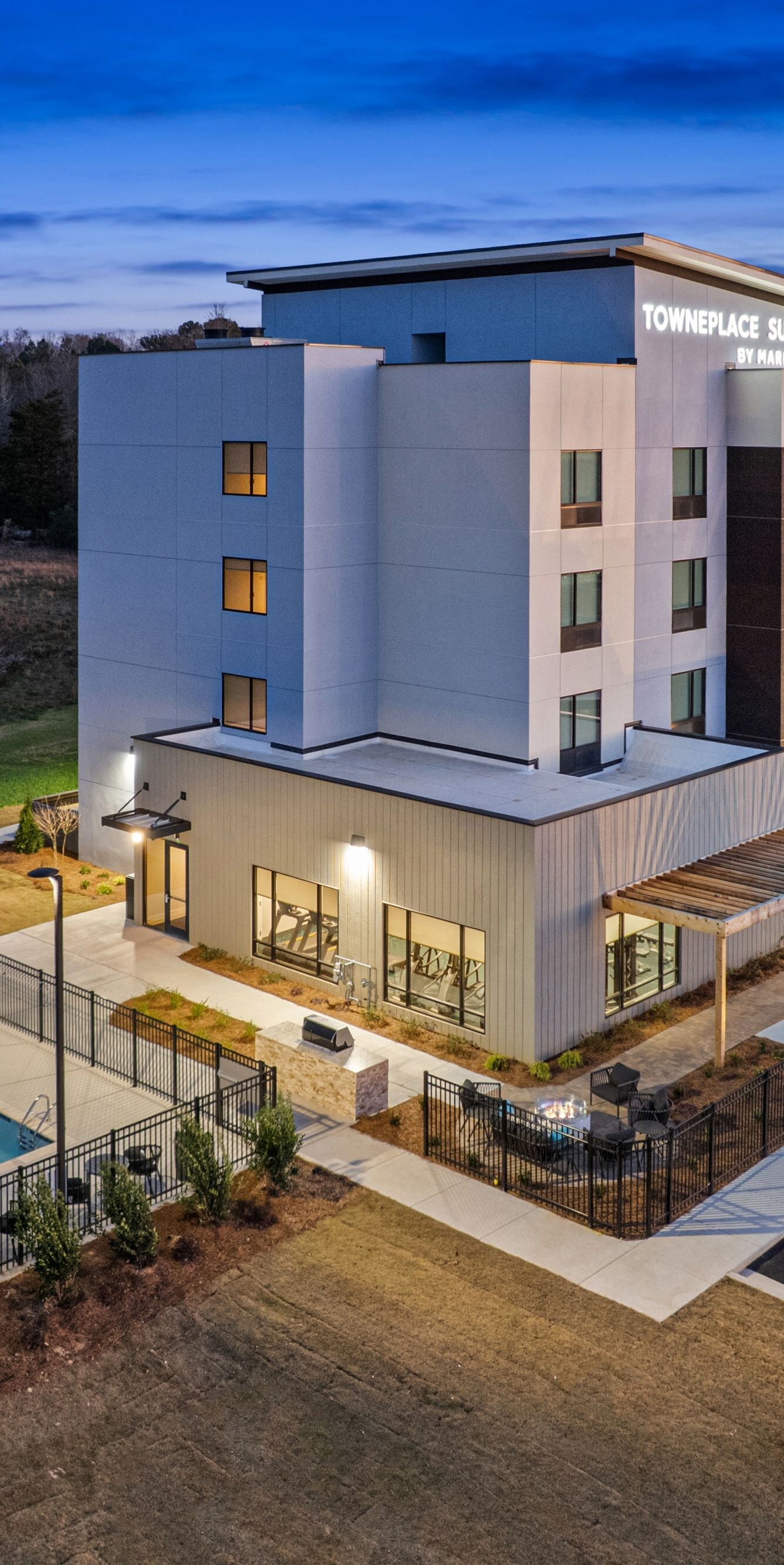 Sunset drone view of the hotel exterior