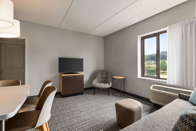 Seating area and television in Two-Bedroom suite