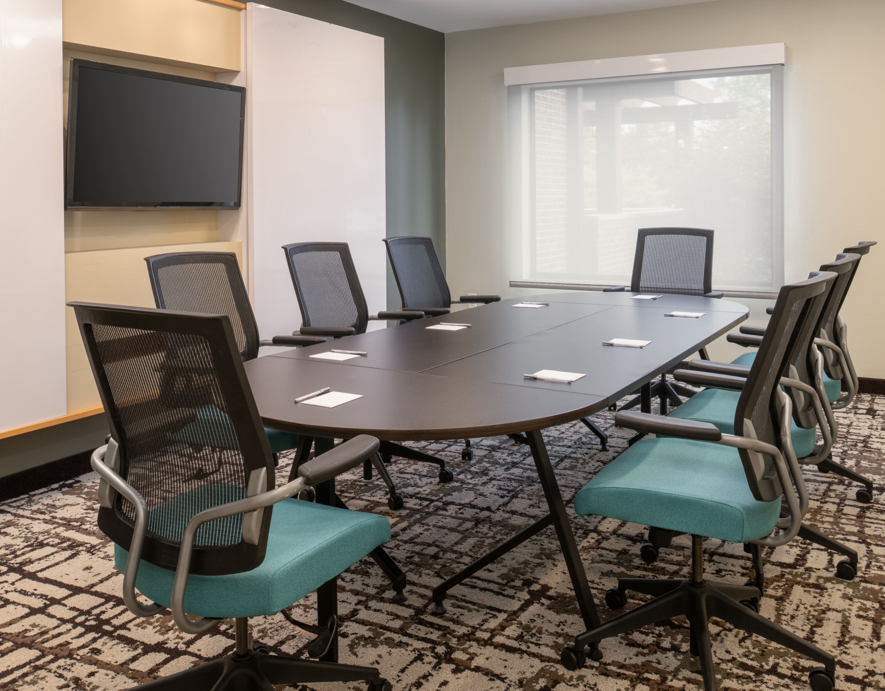 Meeting room with conference table and chairs