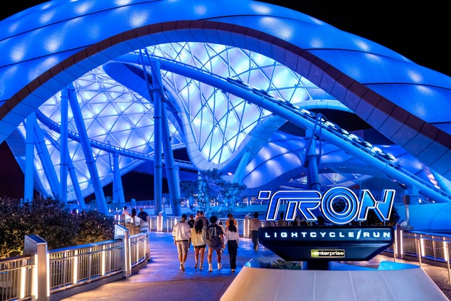 TRON Lightcycle sign at night 