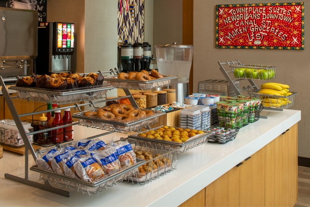 Pastries, Fruit, Coffee, and Juices at Breakfast