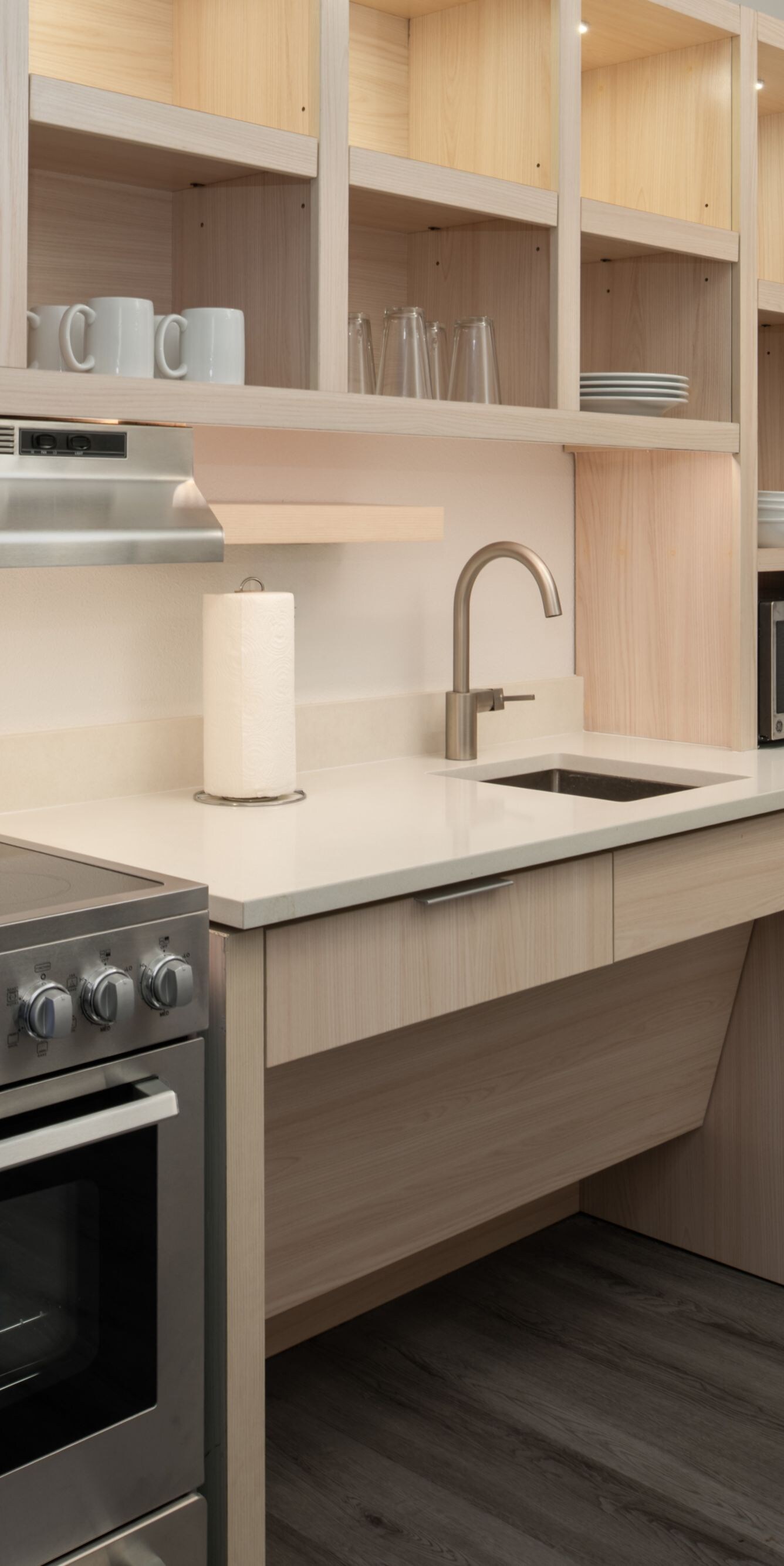 Kitchen with oven, dishwasher, stove & fridge