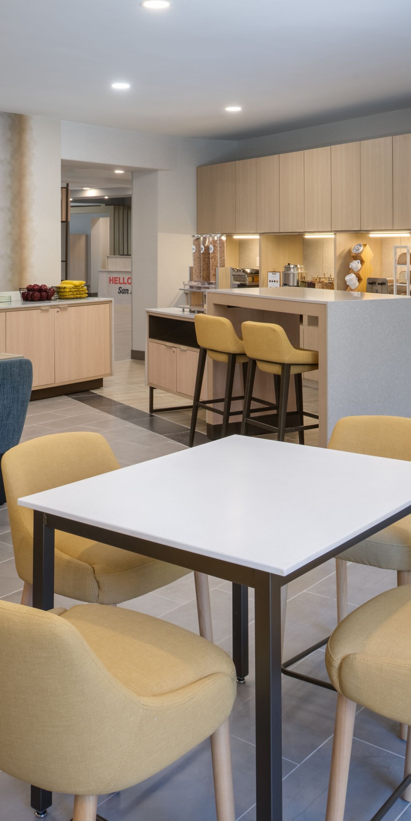 Breakfast Seating Area with chairs, tables & food