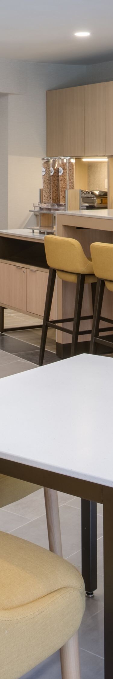 Breakfast Seating Area with chairs, tables & food
