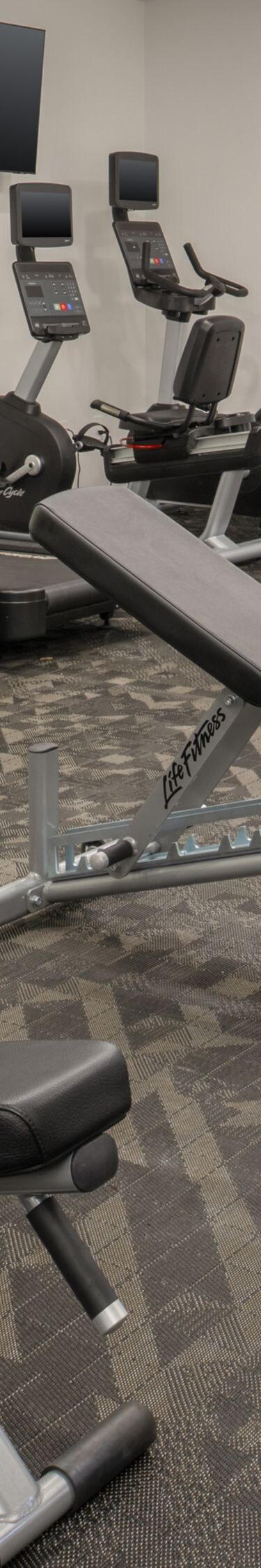 Fitness Center with cardio and cable machines
