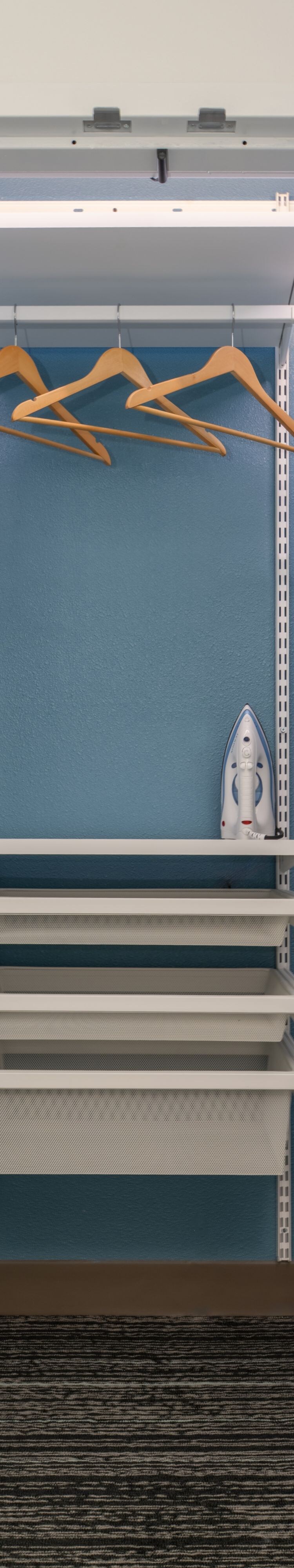 Guest Closet with ironing board, shelves & hangers