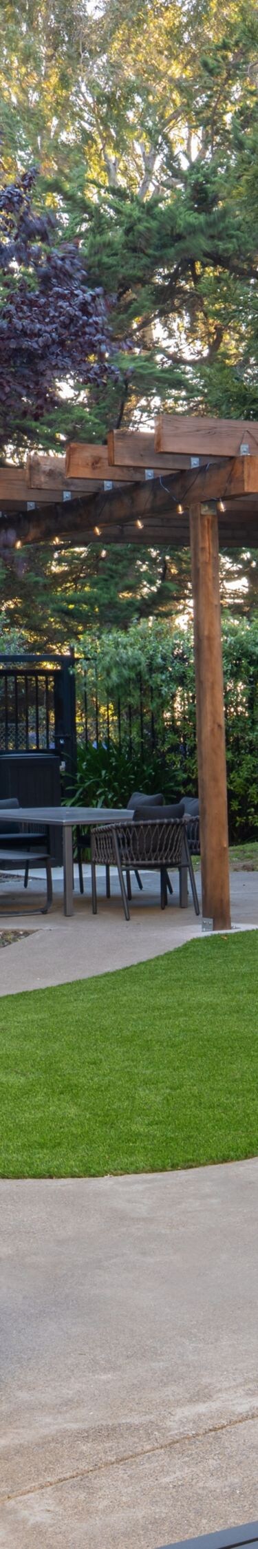Public Patio with a fire pit and grill
