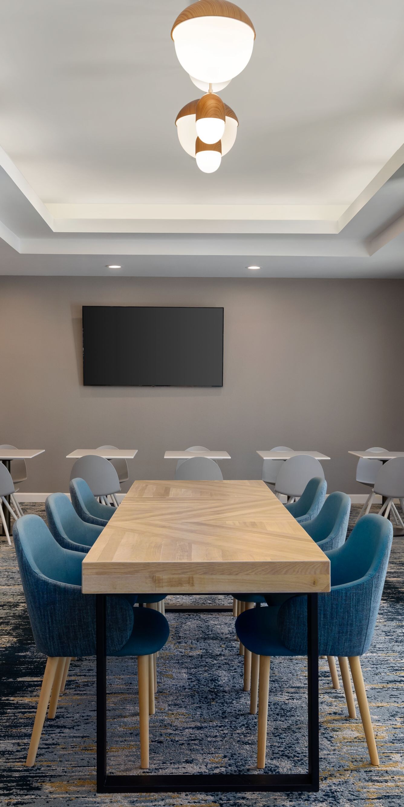 Communal table and chairs in lobby