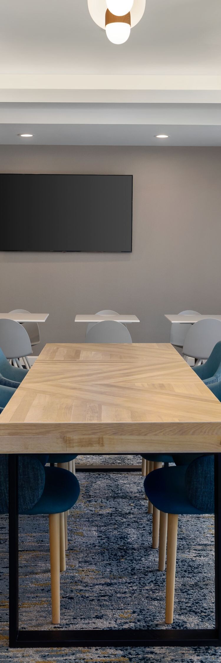 Communal table and chairs in lobby