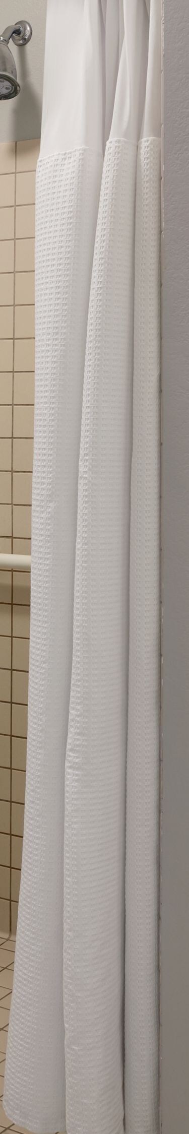roll-in shower with seat and grab bar