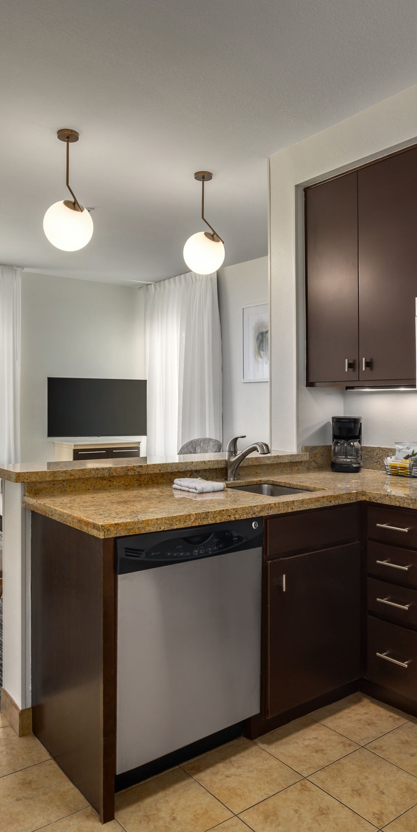 full kitchen, dining, and living rooms