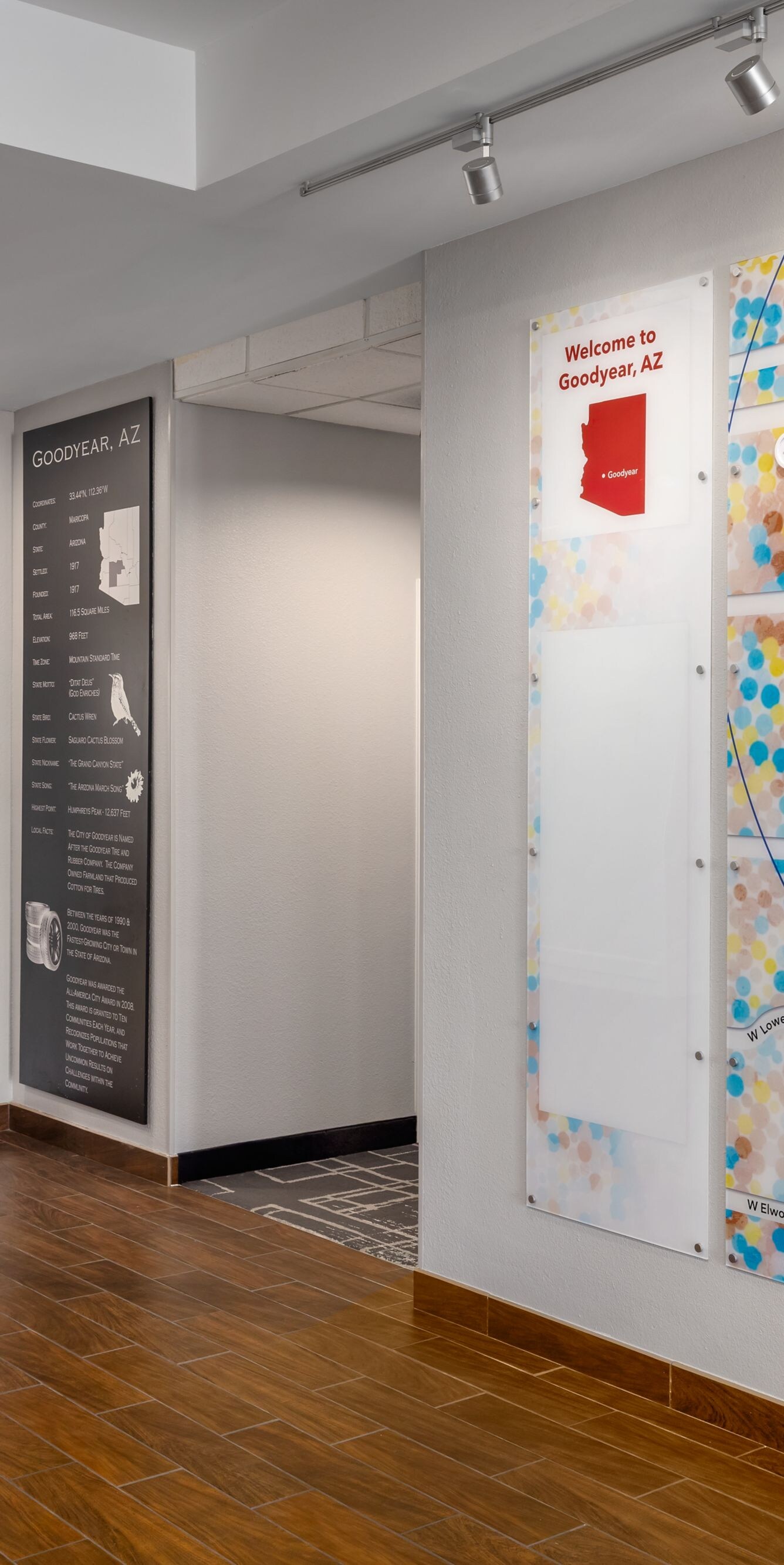 Hotel lobby with map wall and beverage station