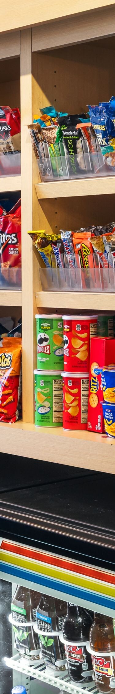 pantry shelves with snacks and beverages displayed