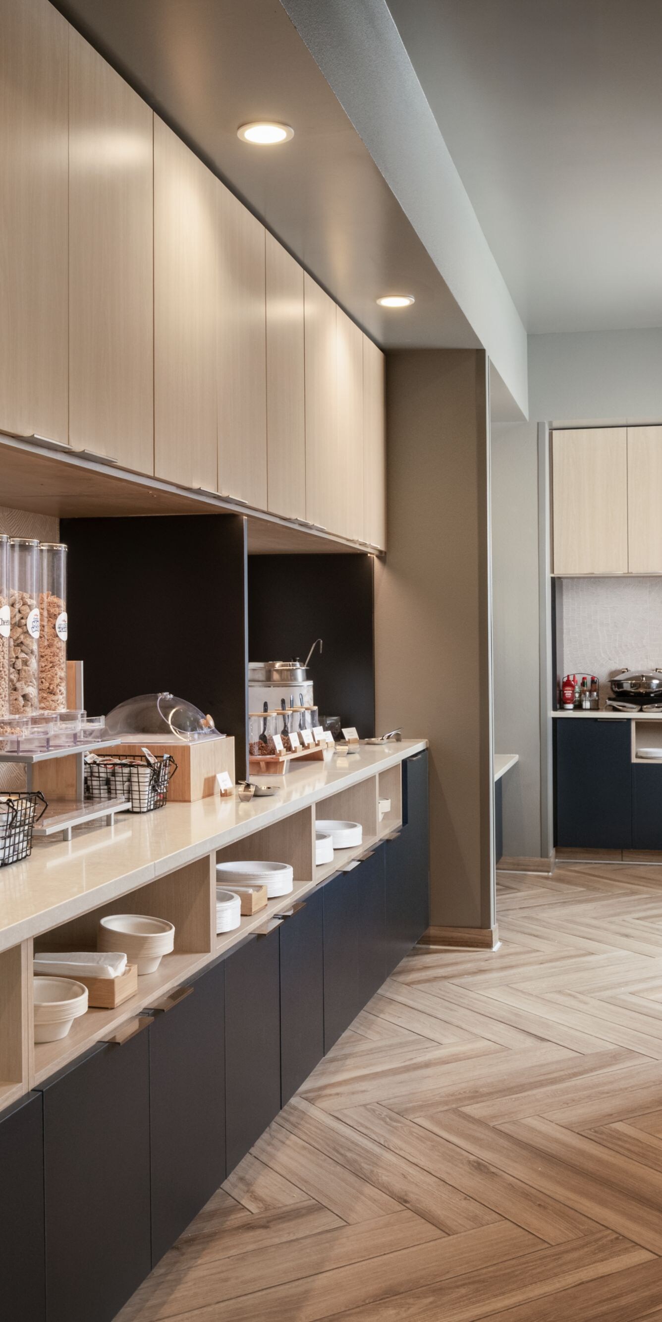 Breakfast buffet with food and serving counter