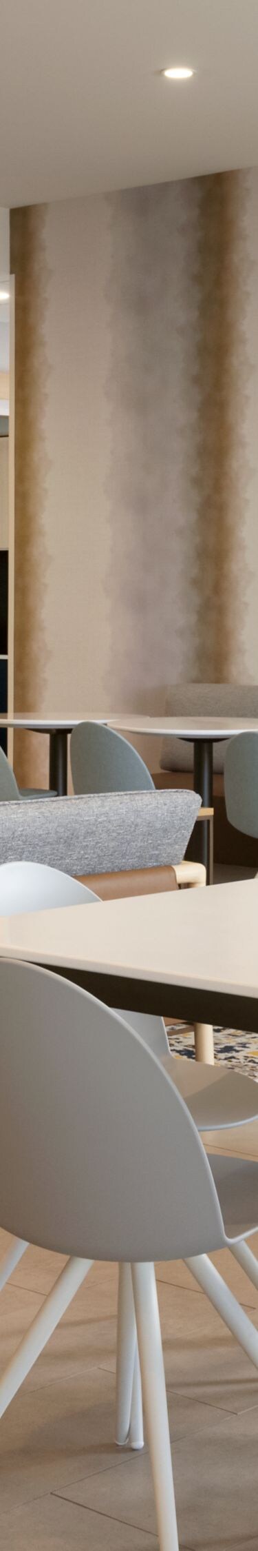 Breakfast seating area with tables and chairs