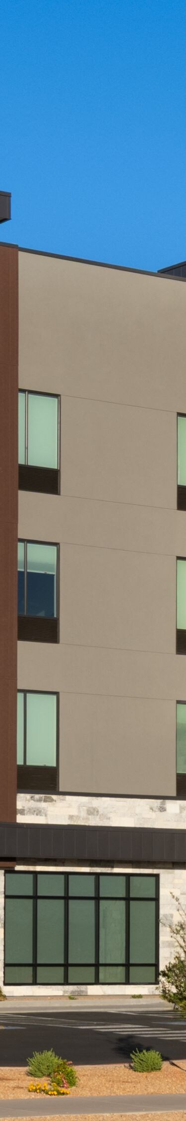 hotel exterior with blue skies
