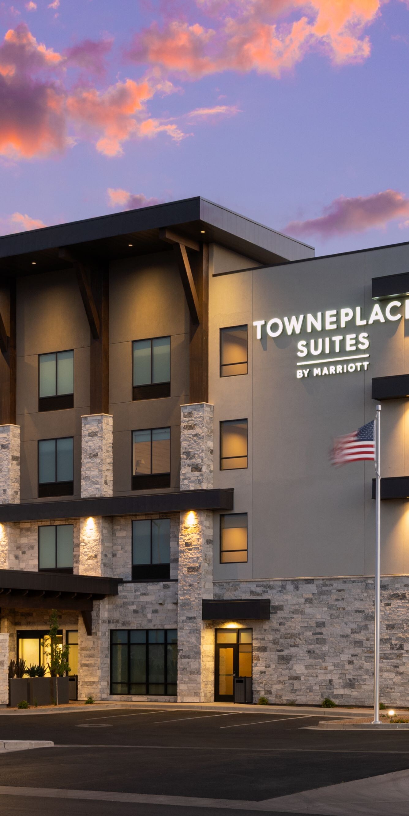 Exterior view of hotel at dusk