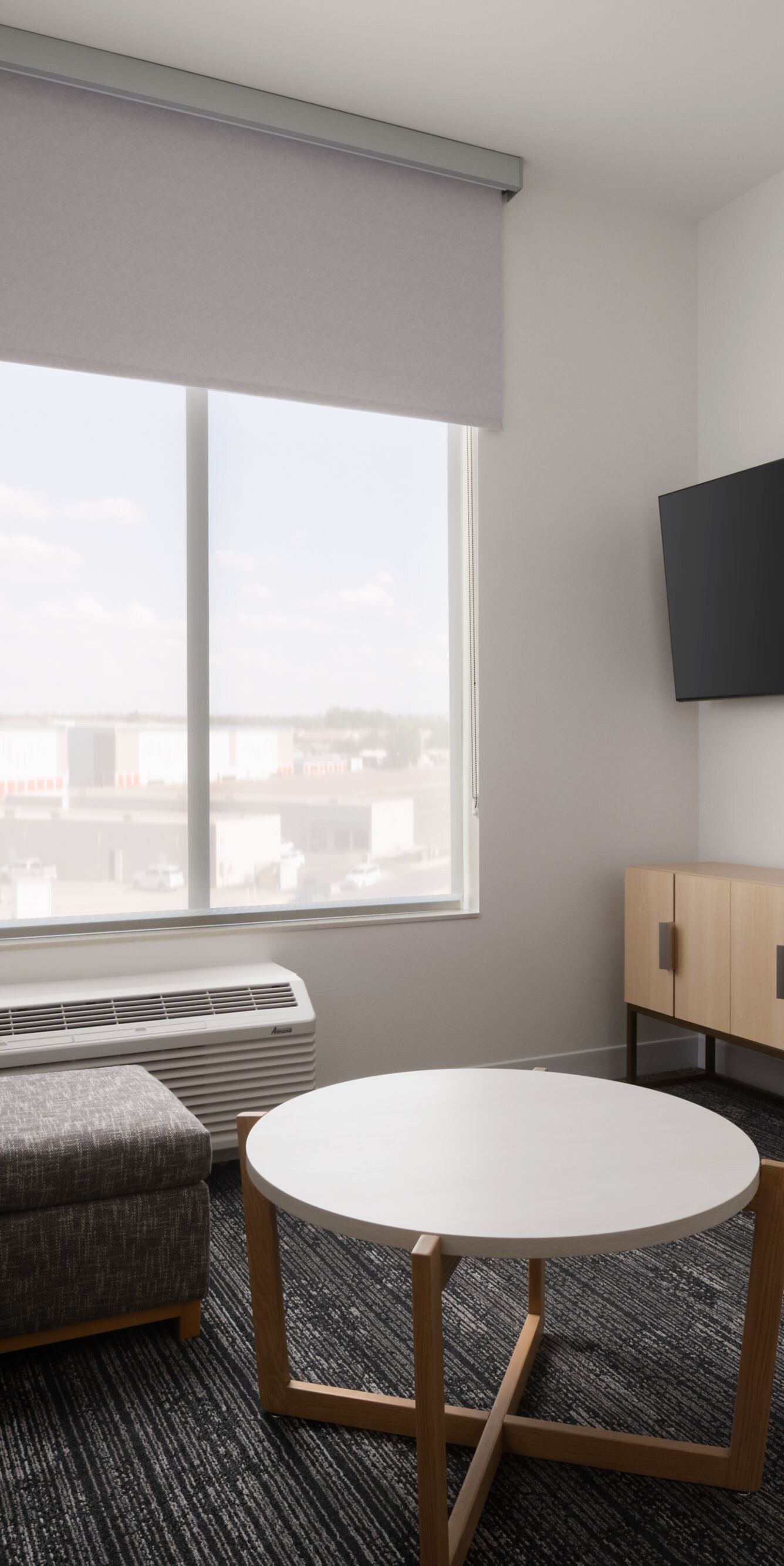 ada one bedroom living area with smart tv and sofa