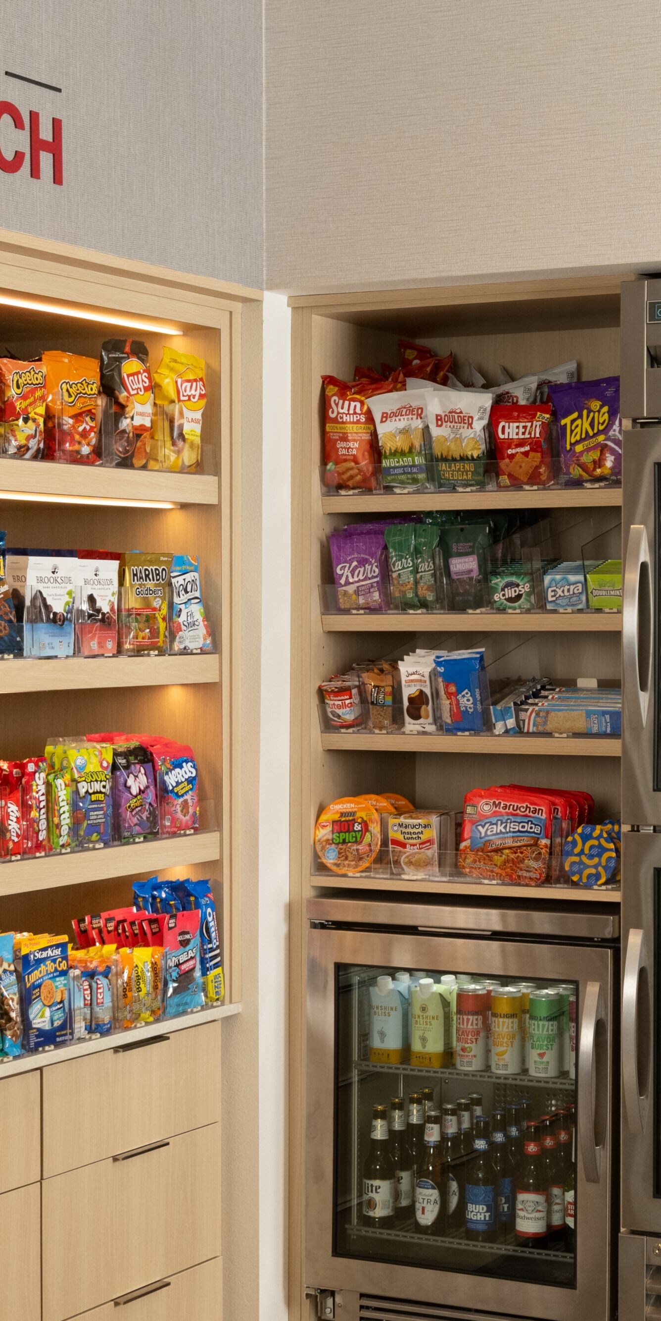 Market shop with snacks and drinks shelves