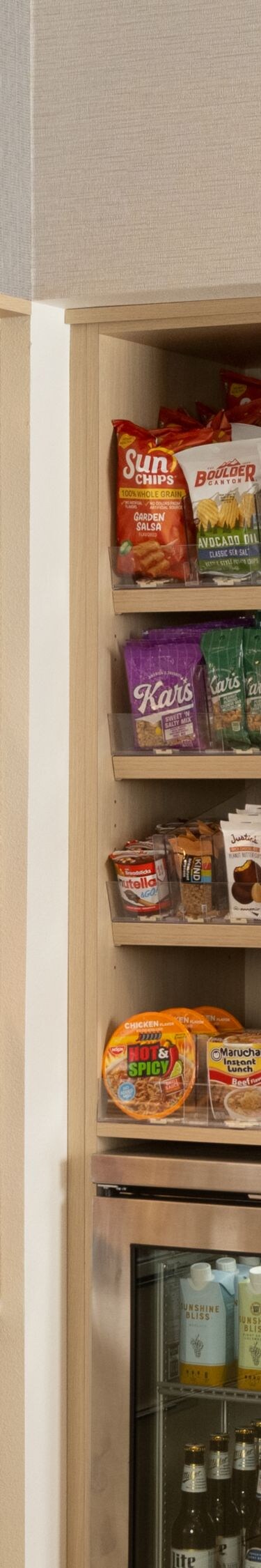 Market shop with snacks and drinks shelves
