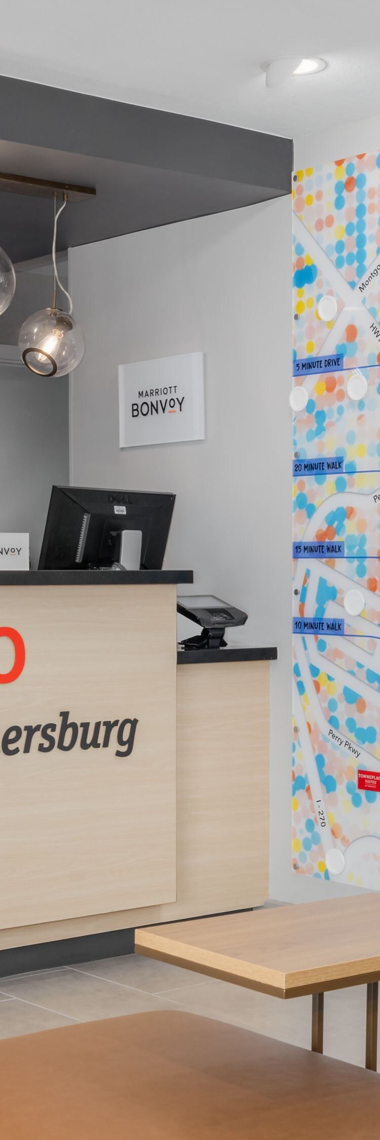 front desk reception area and local wall map