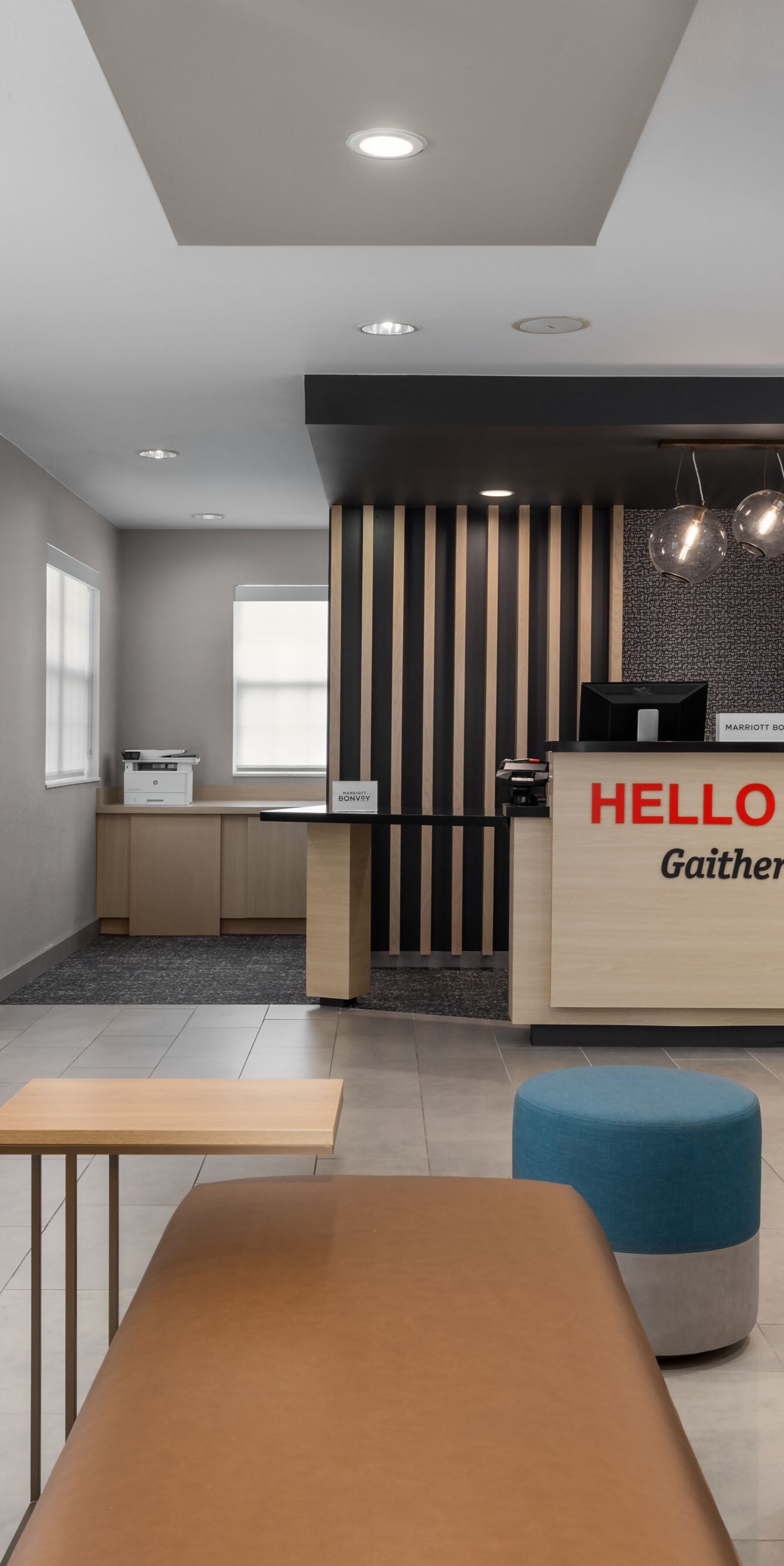 wide view of the lobby with front desk