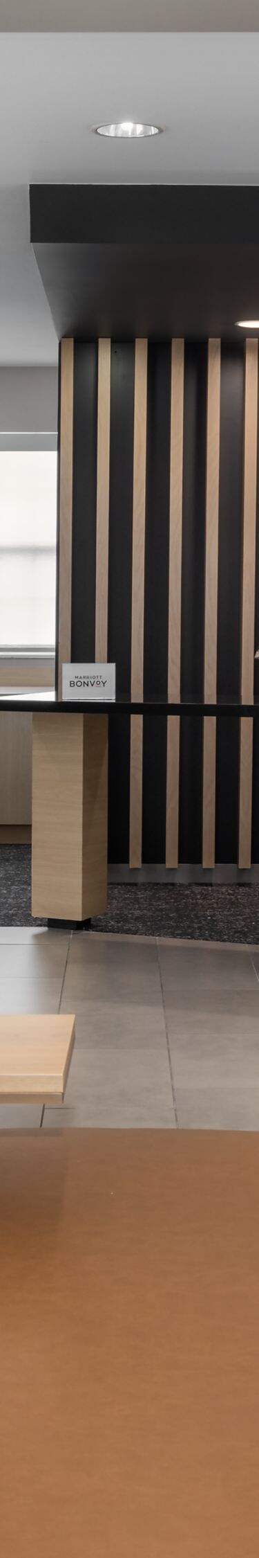 wide view of the lobby with front desk