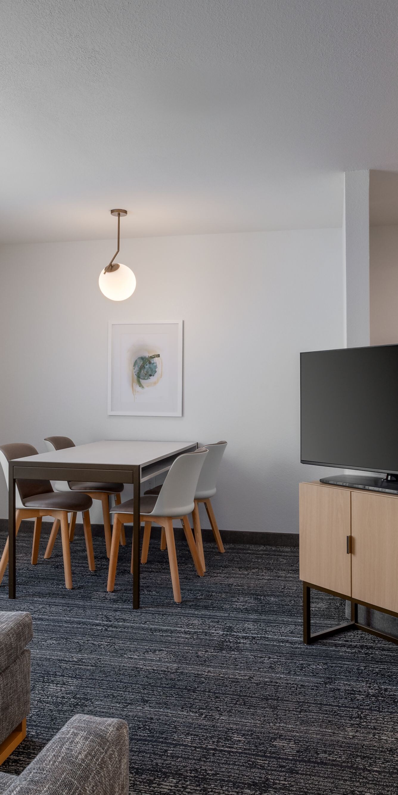 One-bedroom suite living area with kitchen