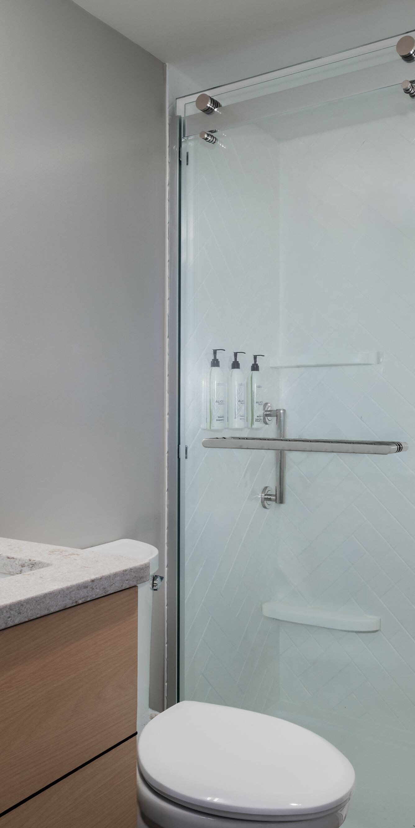 Bathroom with glass shower and vanity