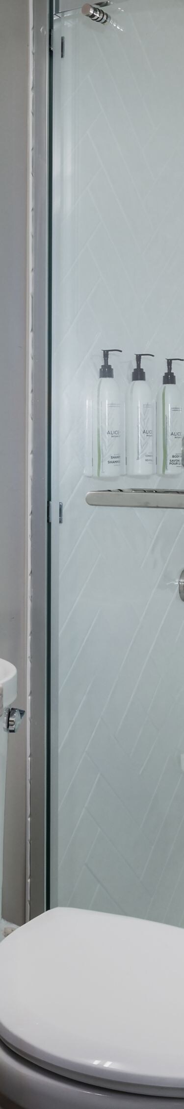 Bathroom with glass shower and vanity