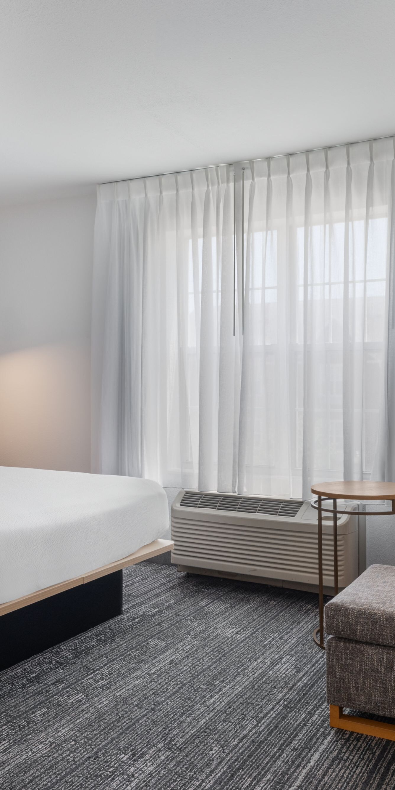 studio with queen bed, sofa seating.