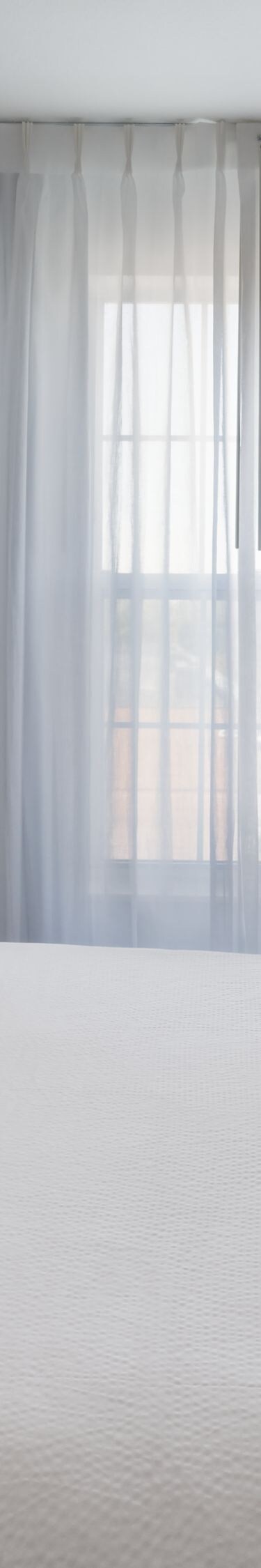 Second bedroom with bed and window