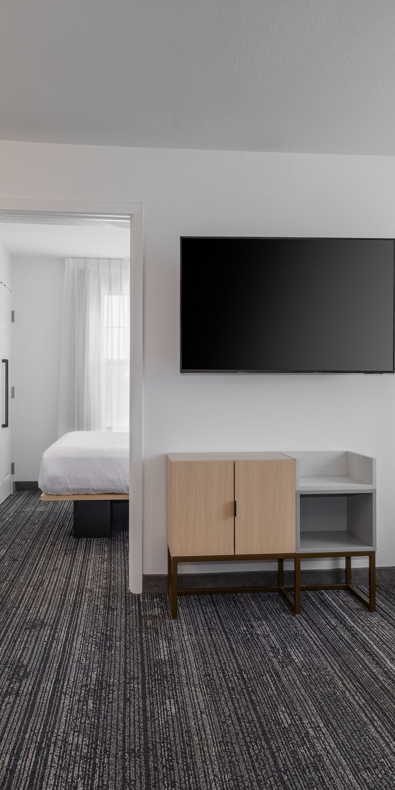 Two-bedroom suite living area with bedrooms