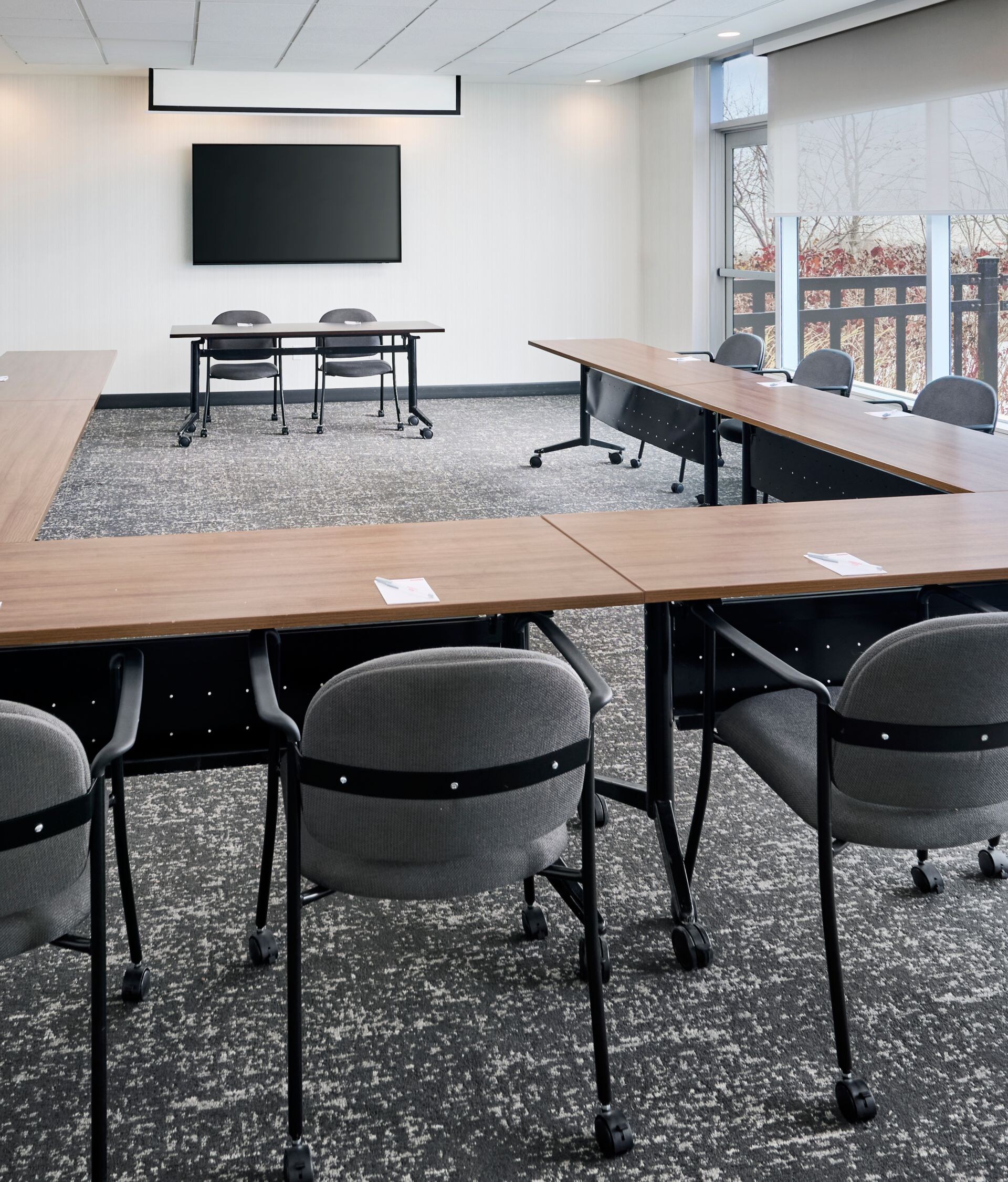 Meeting room with U‑shape table layout