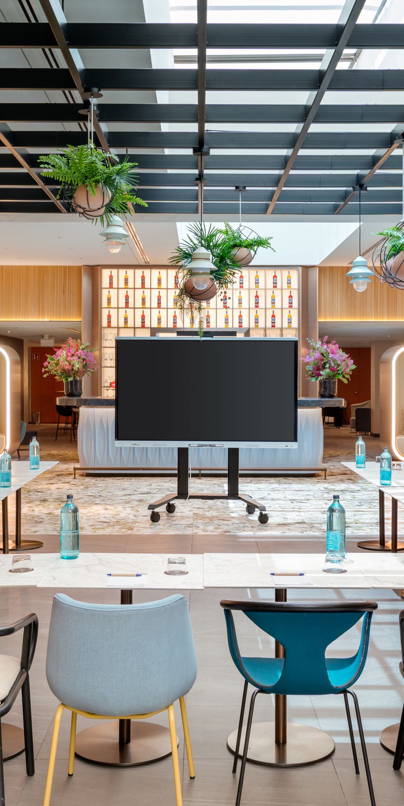 Restaurant set up as meeting room with TV, chairs