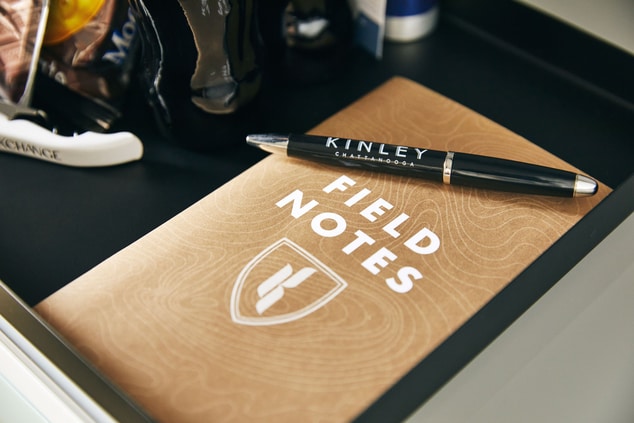 Kinley notepad called Field Notes with Kinley pen