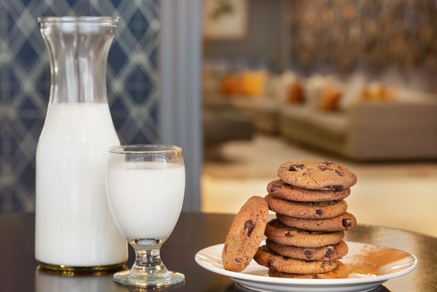 Milk and cookie setup on table