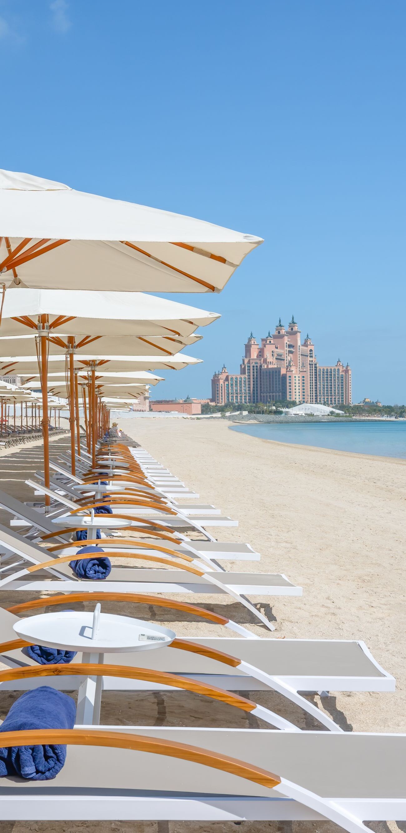 Sun loungers on the beach at Soluna Beach Club 