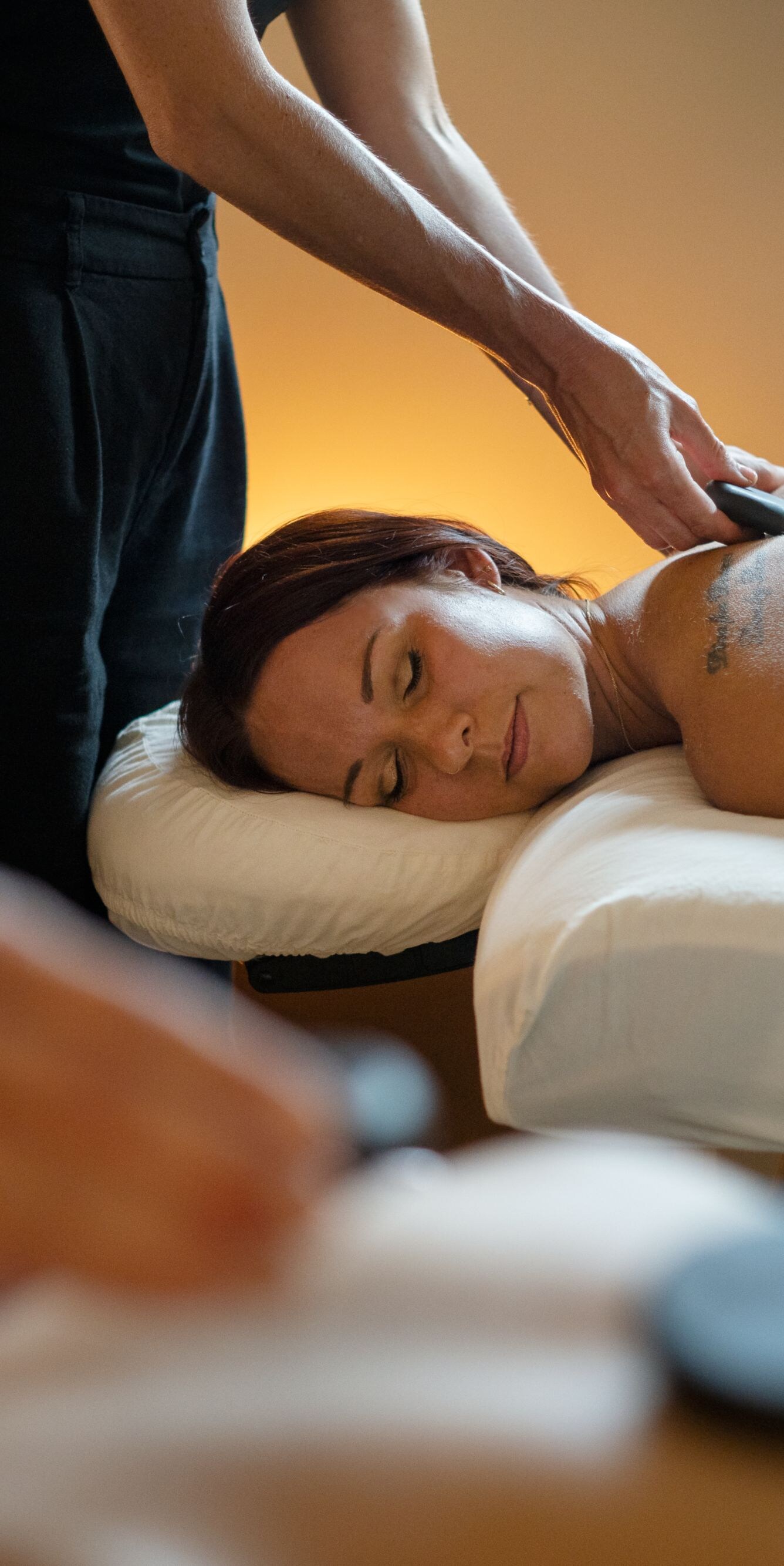 Spa massage with hot stones