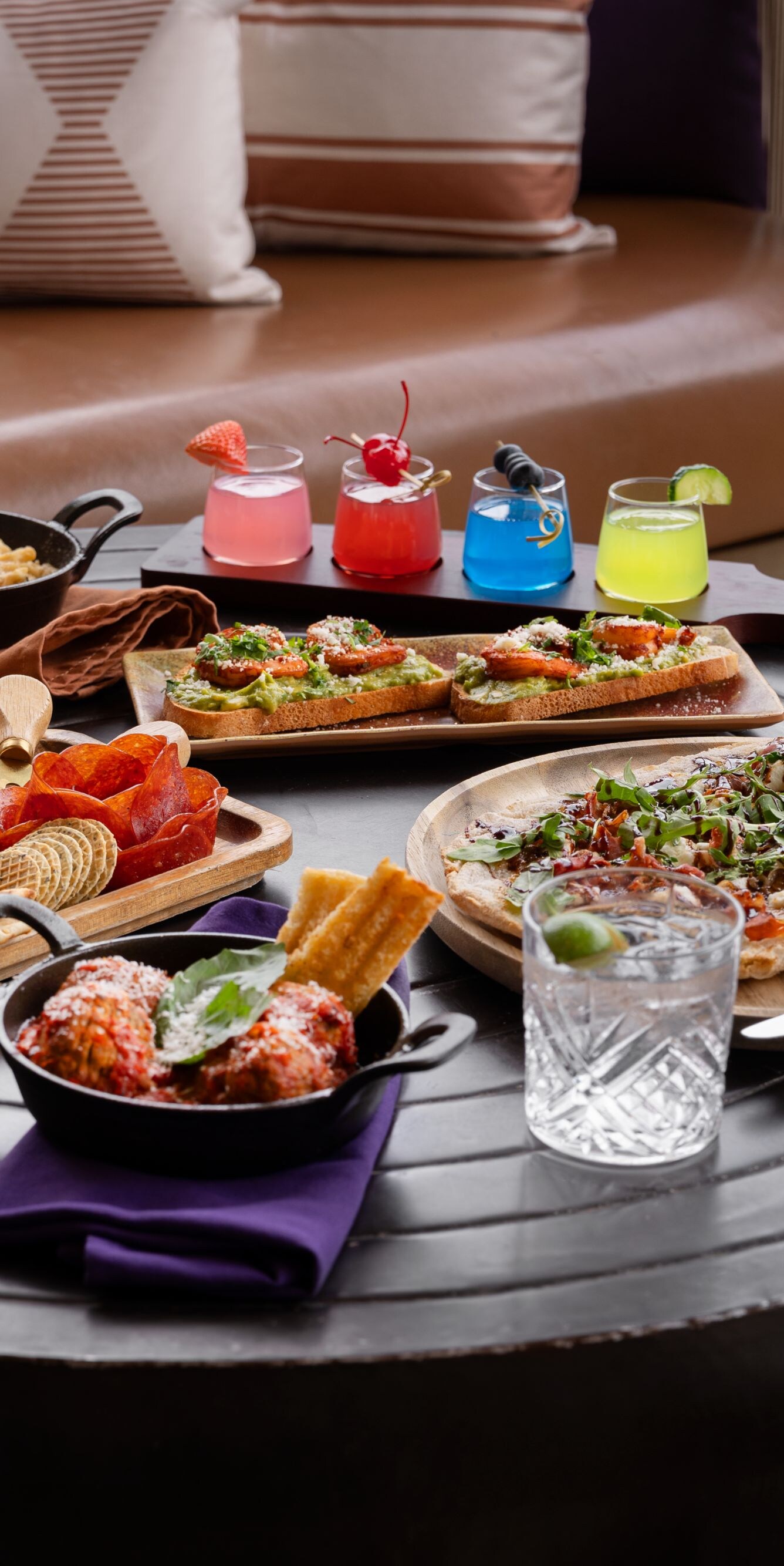 Gourmet appetizers and cocktails on table