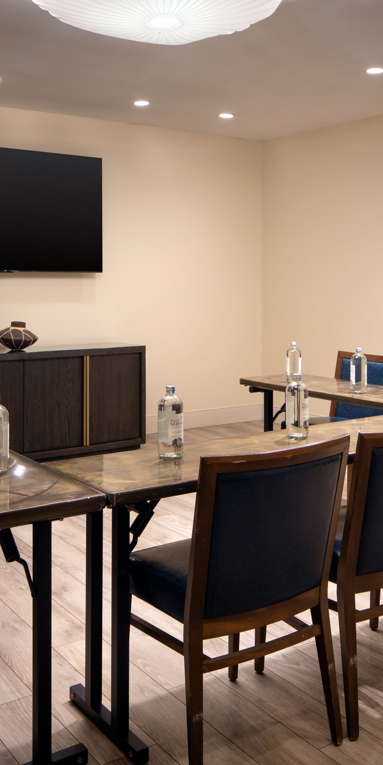 Meeting room with U-shape table and art