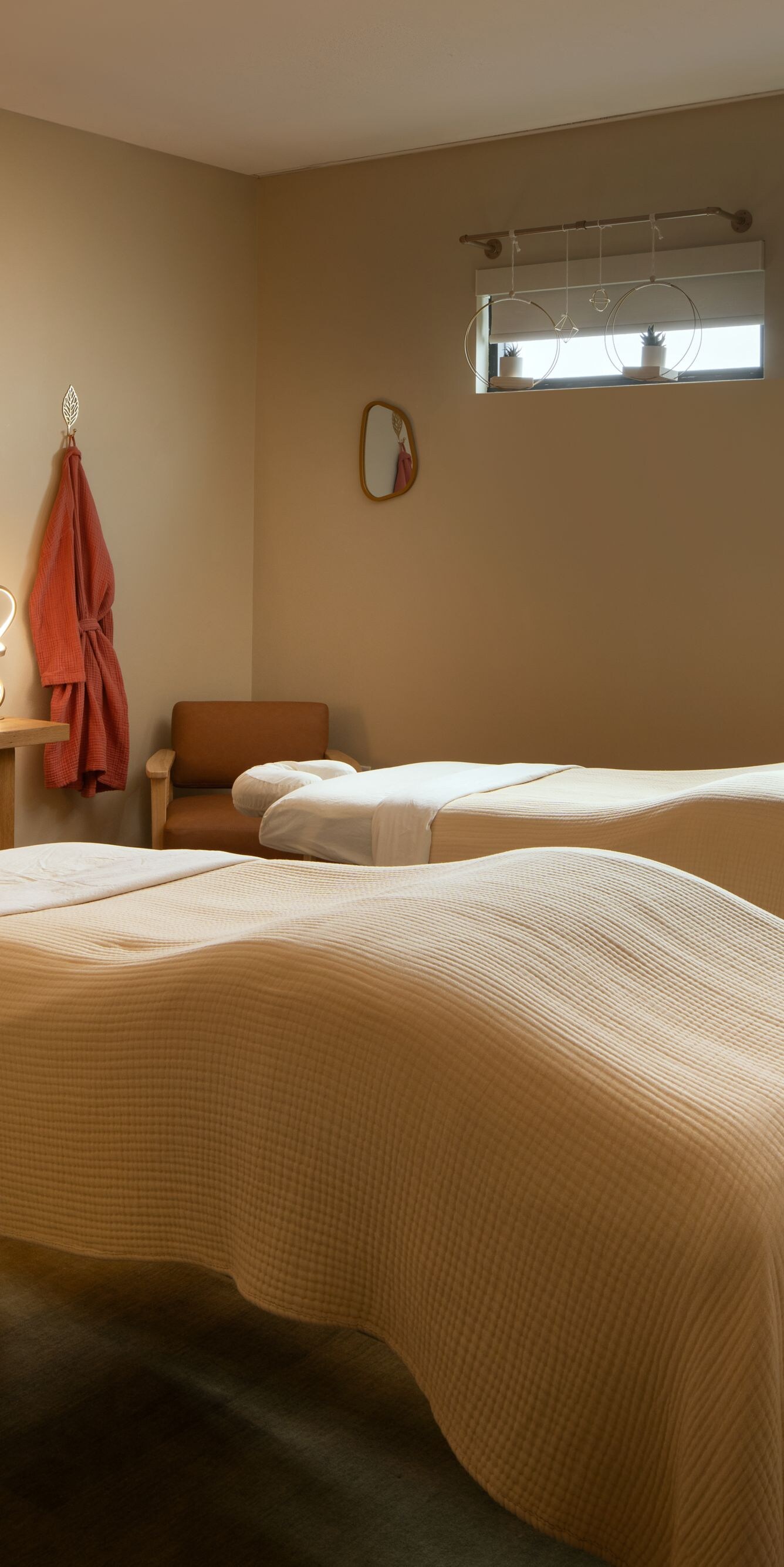 Spa treatment room with two massage tables