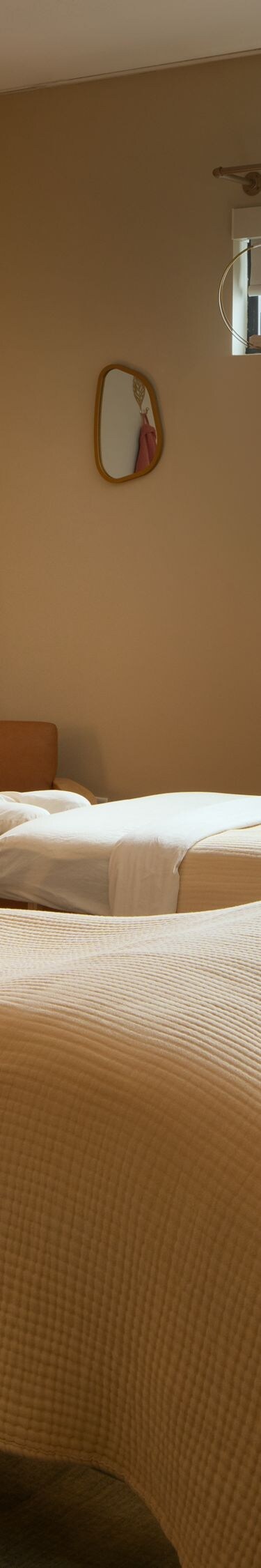 Spa treatment room with two massage tables