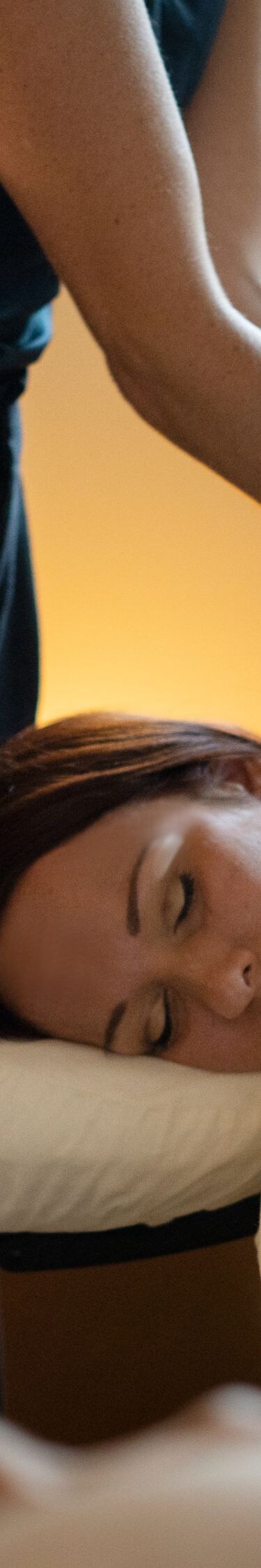 Spa massage with therapist and client