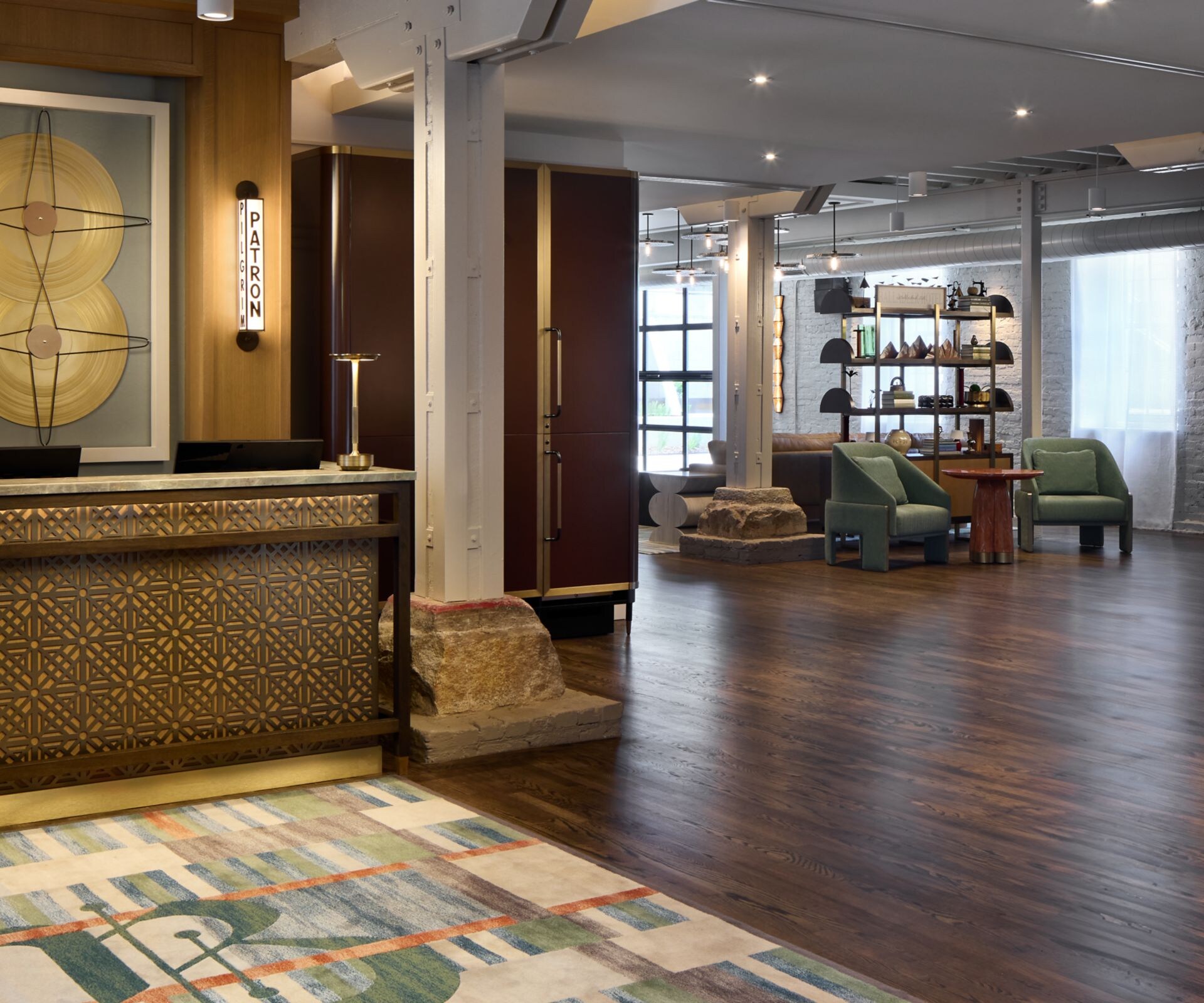 Front desk view with glimpses of lobby features.