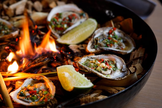 Oysters, fire, limes