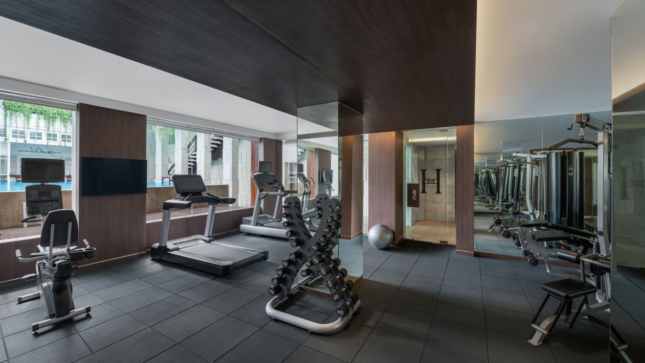 Gym area with weights and machines.
