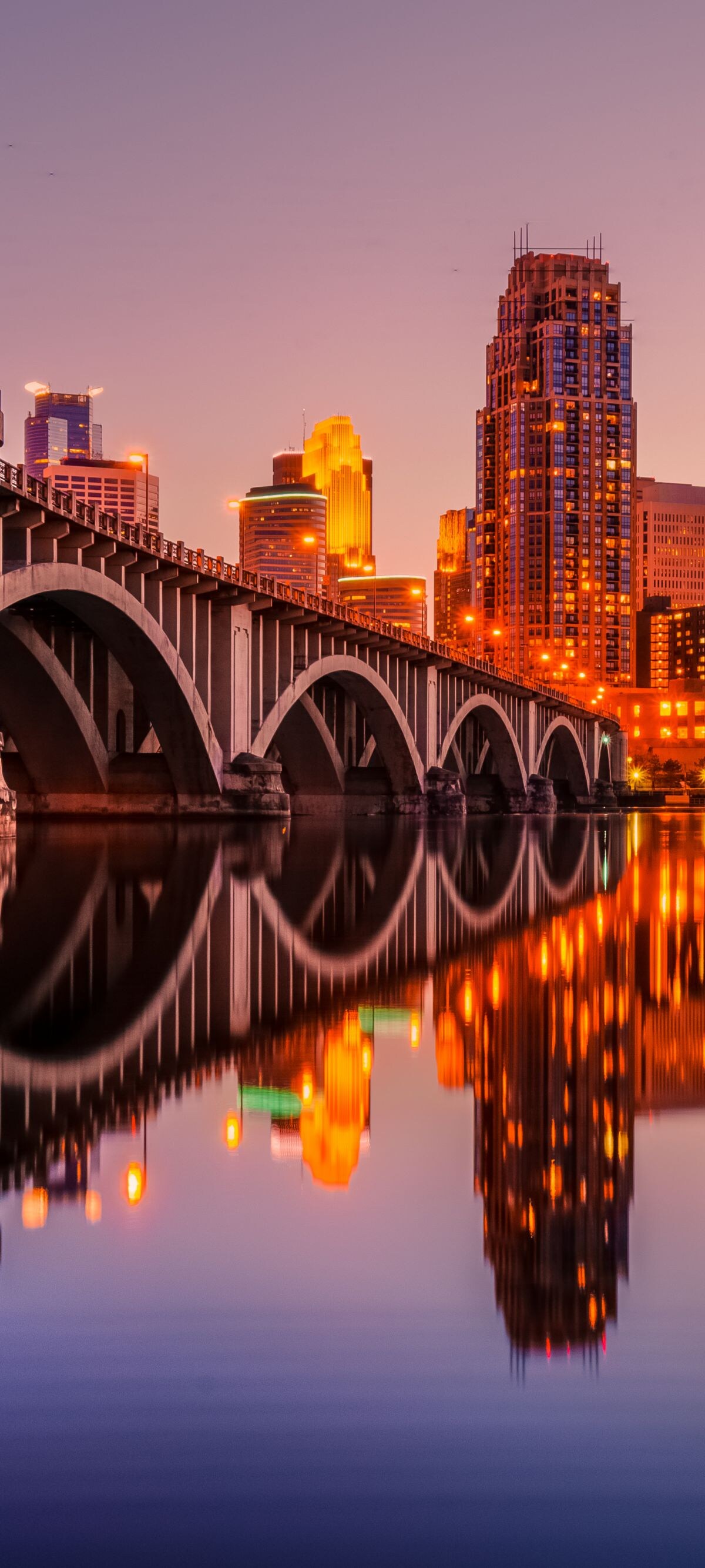 bridge with city in background