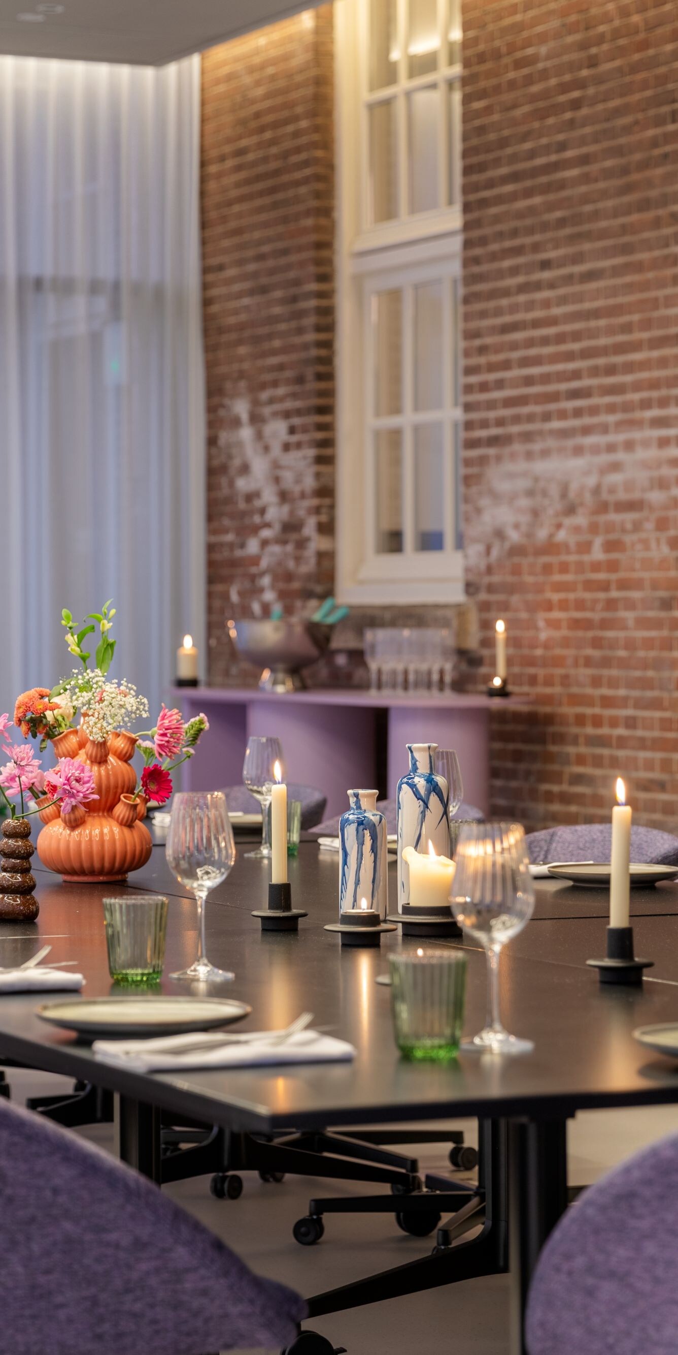 View of a curated private dining table arrangement